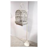 Vintage wicker Bird Cage on white stand