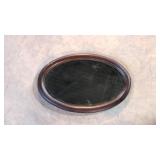 Antique oval beveled mirror
