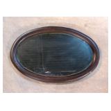 Antique dark oak oval beveled wall mirror