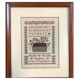 Traditional cross stitch sampler