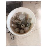 Bucket of old soda bottles