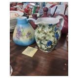 Pair of decorative pitchers