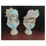 Pair of woman head statues