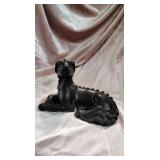 Bronze dog sculpture