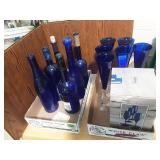Cobalt blue wine bottles and glass stemware