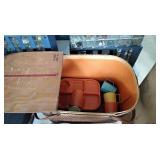 Picnic basket with plastic cups and plates