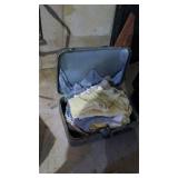 Vintage clothing in suitcase