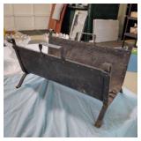 Iron fireplace wood holder
