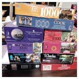 10 used puzzles lot