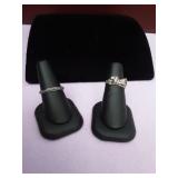 1 erotic ring and 1 silver band