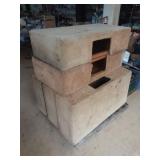 Skid of cat houses podium stage carpeted boxes