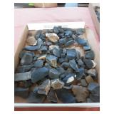 Large flat of finished and unfinished flint rocks