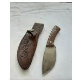 Fixed blade knife with leather sheath