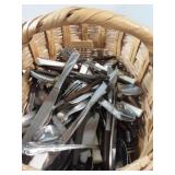 Basket of miscellaneous flatware