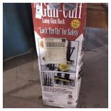 Long gun rack gun cuff lock `em up