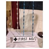 Merchandise clip hangers first aid sign