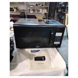 Oster 1.1 cu ft countertop microwave