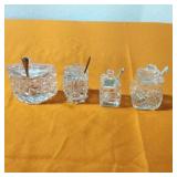 Cut glass sugar or salt servers with silver spoons Cut glass sugar or salt servers with silver spoons