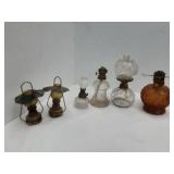 Small antique oil lamps