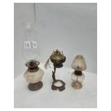 Small antique oil lamps