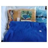 Two blankets and a bed spread