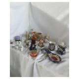 A collection of glass thimbles,  and more