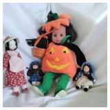 A pumpkin girl and small dolls