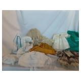 Hat box full of Doll Dresses