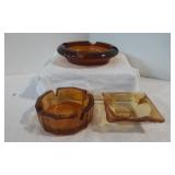 Set of Three Assorted Amber Glass Ashtrays