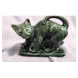 A Scaredy Cat planter, green