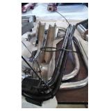 Motorcycle heat shields and crash bars