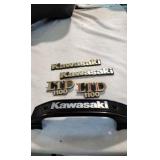3 various Kawasaki emblems