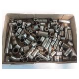 Assortment of different size sockets.