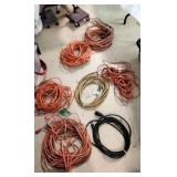 Assortment of 7 extension cords.