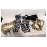 Assortment of ropes of different sizes.