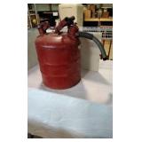 Vintage metal 5 gallon gas can.