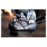 Black Max air compressor.