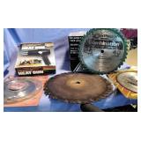 Heat gun, battery charger and saw blades