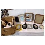 Large collection of picture frames.