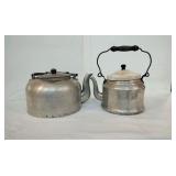 (2) Aluminium kettles with wooden Handles.