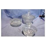 Three covered candy dishes