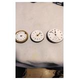 Three pocketwatch faces and mechanisms