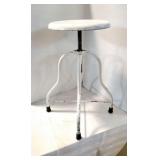 Metal adjustable stool.