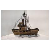 Decorative iron fishing boat.