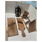 Antique food slicers and oil lamp