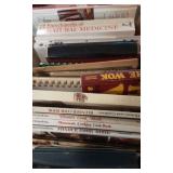 A box of Vintage cookbooks