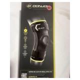 Stabilizing knee sleeve