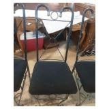 4 rod iron chairs