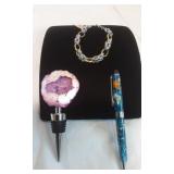 Amethyst-like bottle cork, bracelets and pen