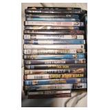 Assorted DVDs, VHS tapes and one singular game